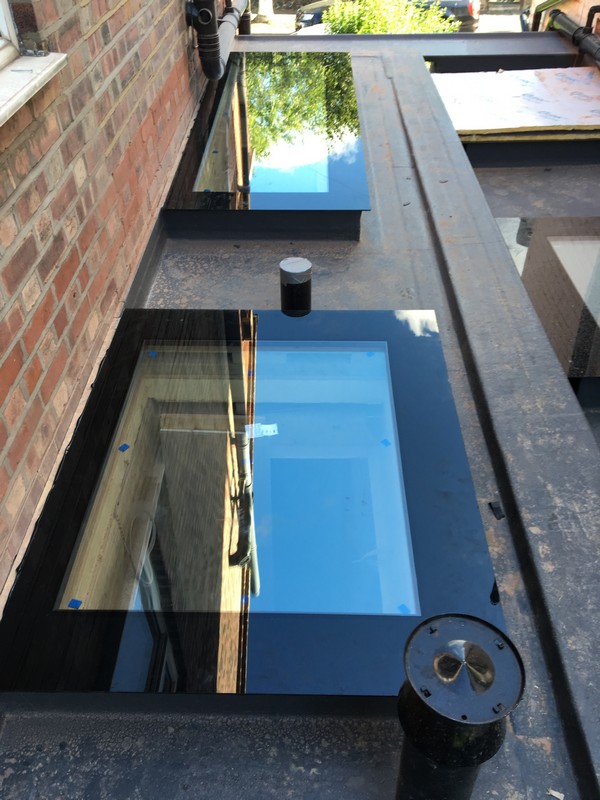 Multiple flat roof skylights on extension in Bellingham